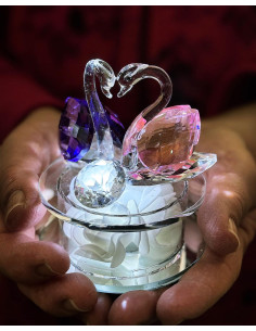 Crystal wedding favor with a pair of swans with pink wings and lilac wings with LED light